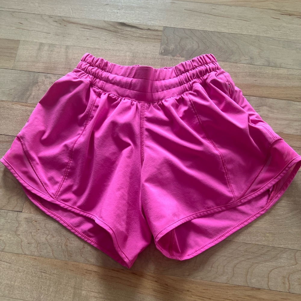EUC-worn one time. Pink- hard to get color. Hott Hot 4" low rise.